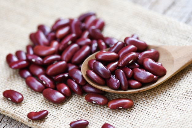 Red bean in wooden spoon on sack - Grains red kidney beans