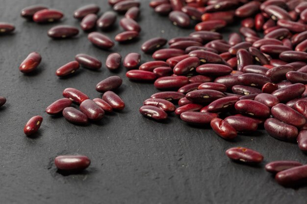 Red beans on the black table