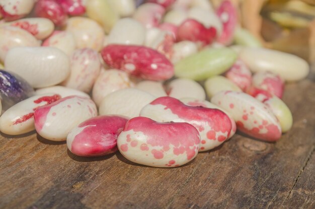 Red beans seeds on a wooden table