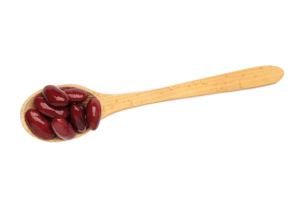 Red beans on wooden spoon isolated on white background Healthy food concept