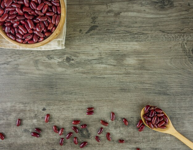 Red beans on wooden table and copy space