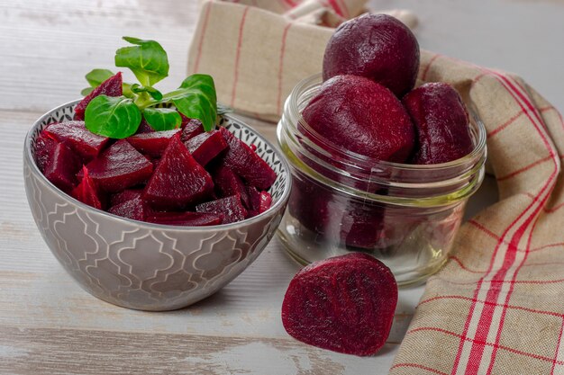 Red beetroot cutting into pieces in a bowl