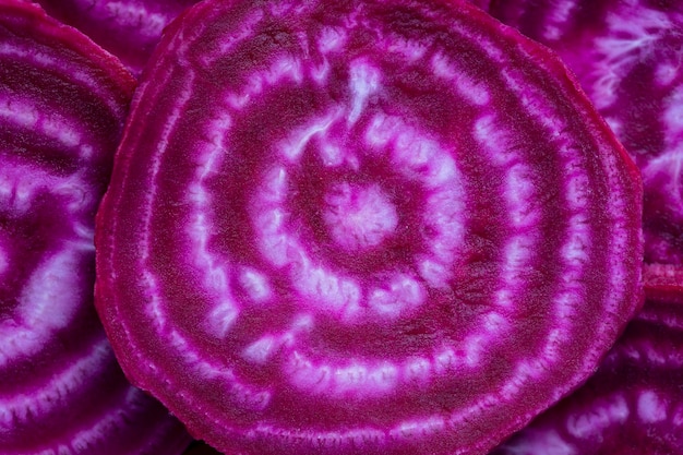 Red beetroot slice closeup Purple beet cut in half with the texture of pulp Beetroot slices background top view