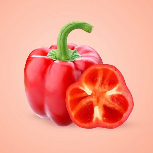 Red bell pepper on a pink