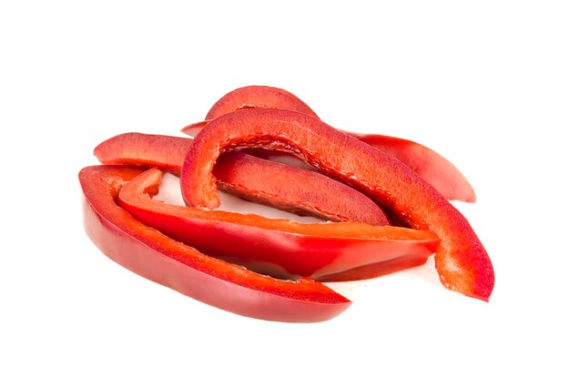 Red bell pepper slices that remain on the backbound