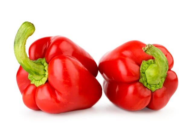 Red bell peppers on a white background