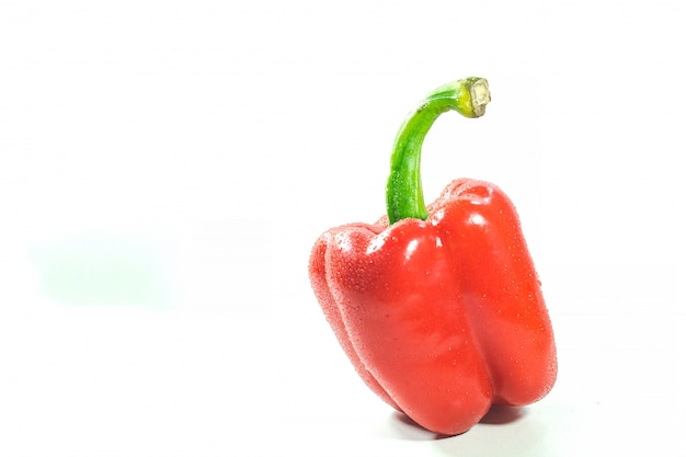 Red bell peppers on white