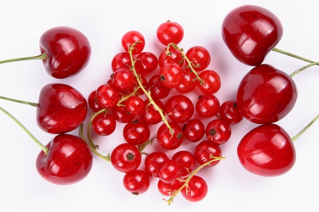 Red berries isolated on white background Closeup of sweet berries Healthy food concept