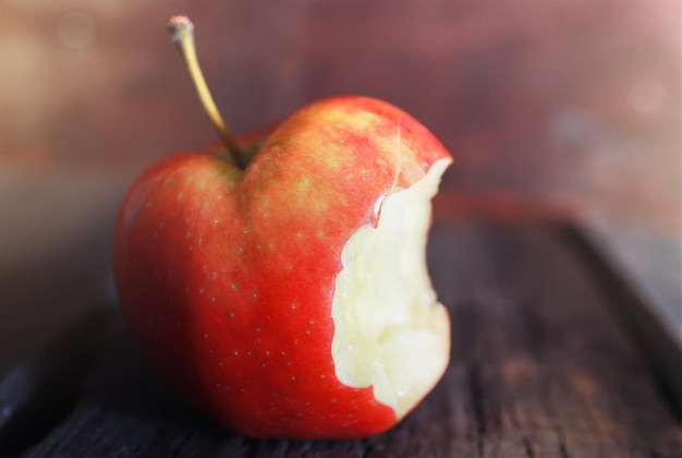 Red bitten apple