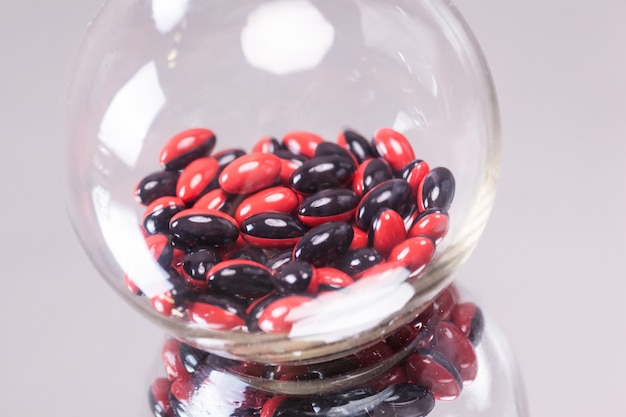 Red-black capsule medical flask 