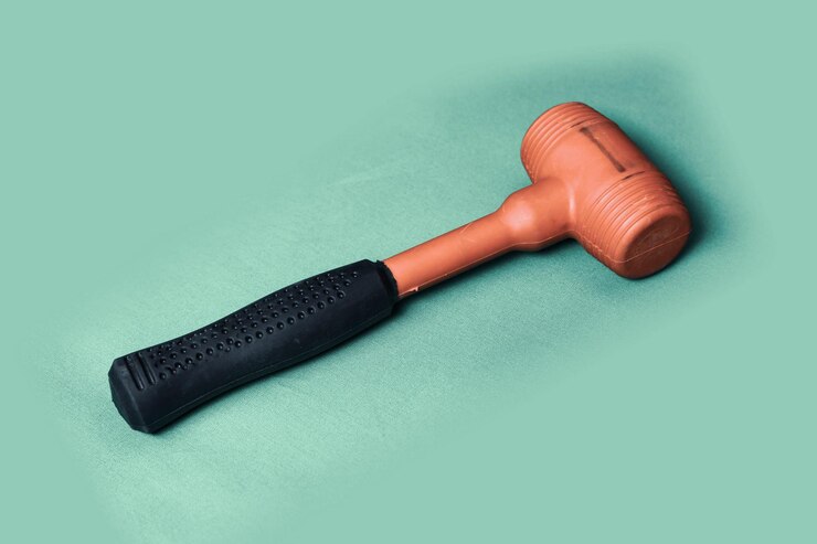 red and black rubber hammer