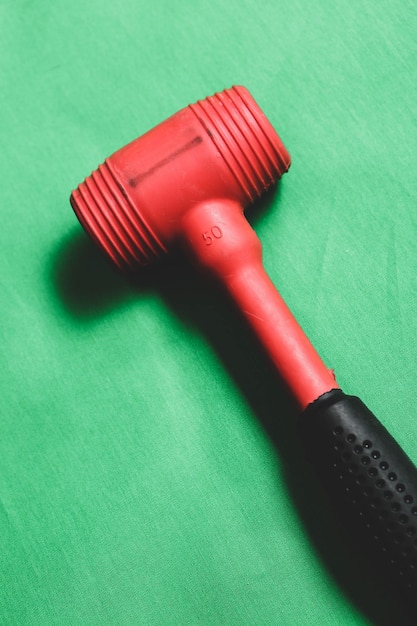 Red and black rubber hammer