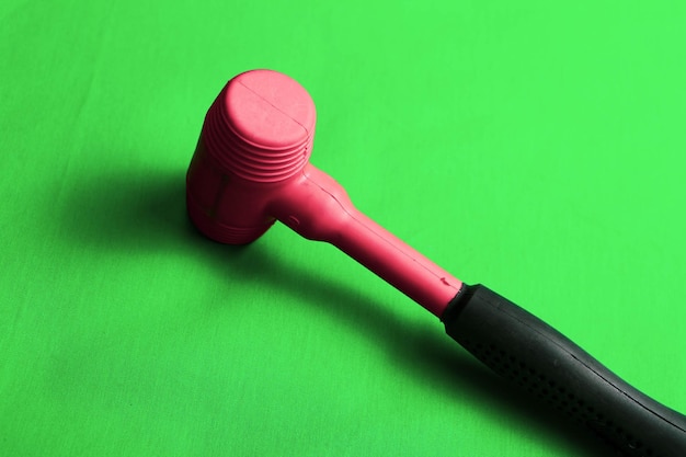 red and black rubber hammer