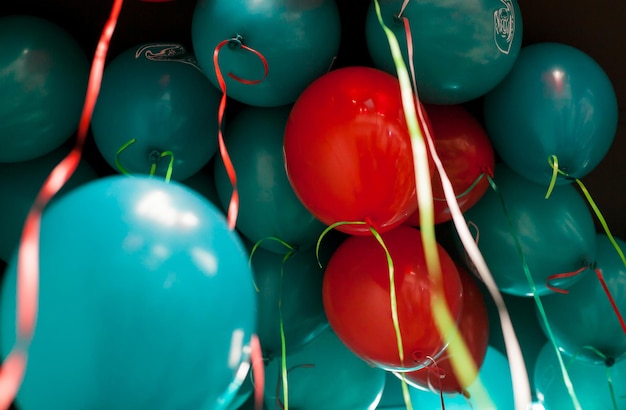 red and blue balloons under the ceiling many red and blue balloons background for a greeting card