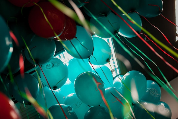 Red and blue balloons under the ceiling many red and blue
balloons background for a greeting card