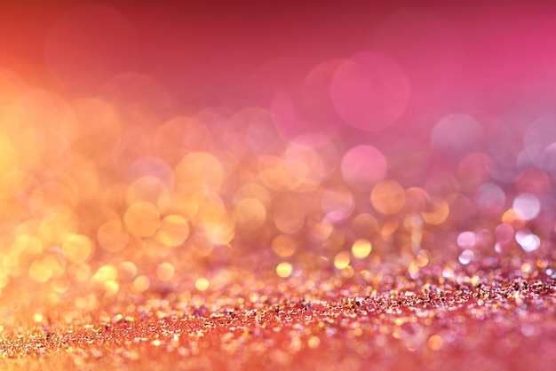 Red blurred abstract shiny valentines day background with bokeh effect, festive pink glitter sparkles