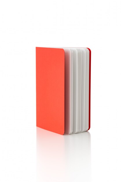 red book or notebook on isolated white background