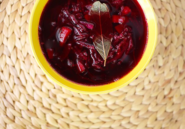 Red borscht or beetroot soup with sour cream.