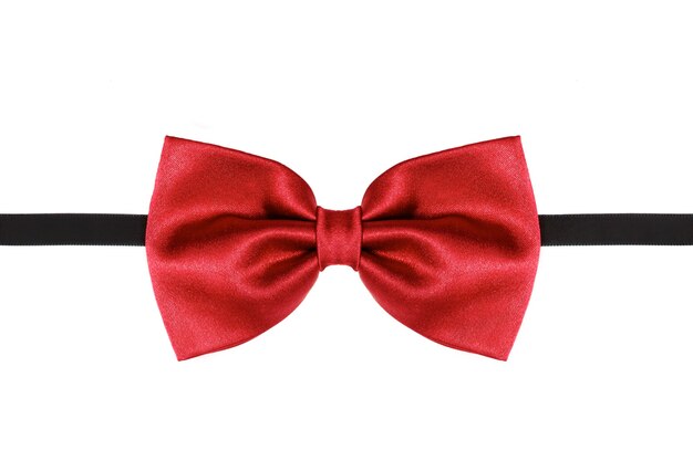 Red bow tie close up isolated on white background.