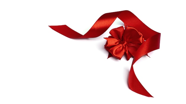 Red bow on a white background