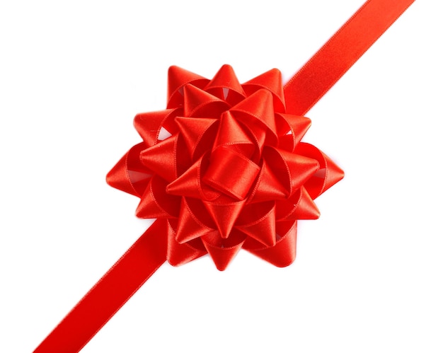 Фото Красный бант с диагональной лентой на белом фоне