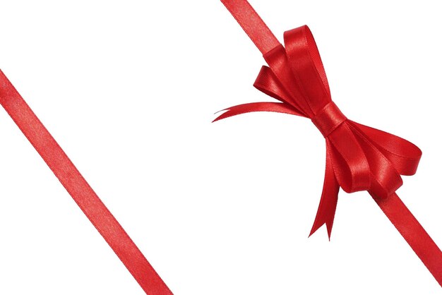 Red bow wrapped around white background
