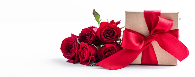 Red box with roses on a white surface