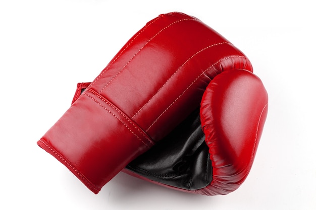 Red boxing gloves on white background isolate