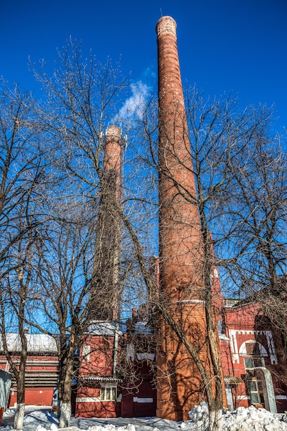 Red brick chimneys of an old factory in moscow