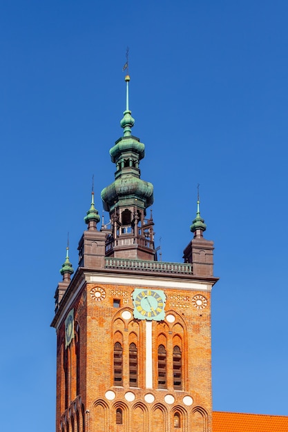 Red brick church tower in the center of the city of Gdansk