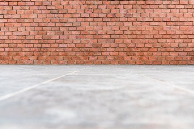 Photo red brick wall and floor background