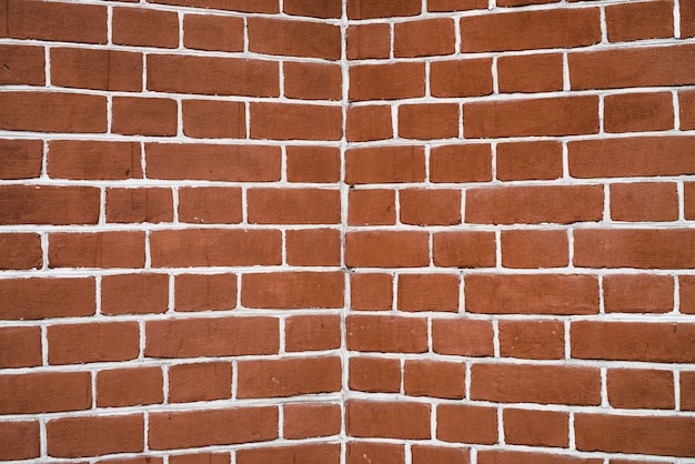 Red brick wall in perspective. 