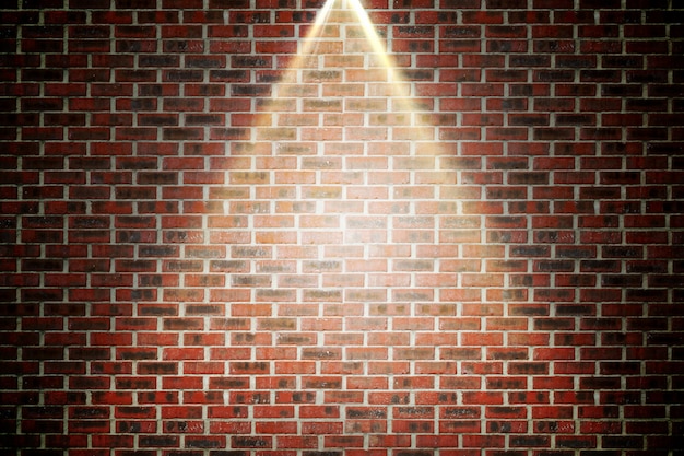 Photo red brick wall under spotlight