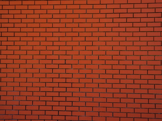 Текстура стены из красного кирпича Фото
