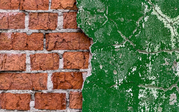 Red brick wall with shabby green paint High quality photo