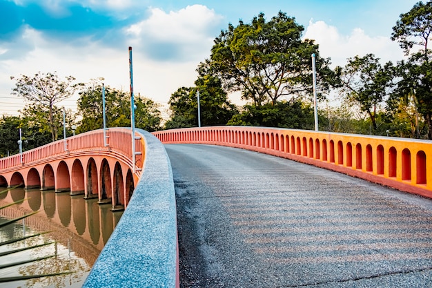 Red bridge in  Chatuchak Park Bangkok Thailand