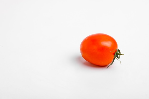 Red, bright, juicy, fresh tomatoes isolated