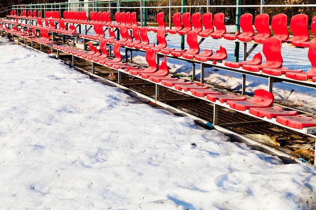 Red broken plastic seats