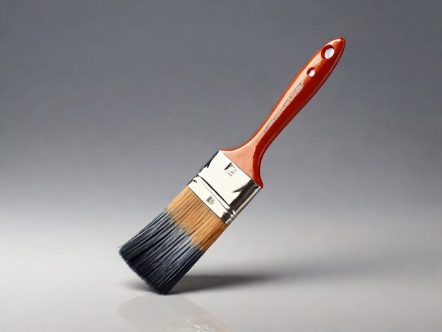 a red brush with a white handle and a red handle