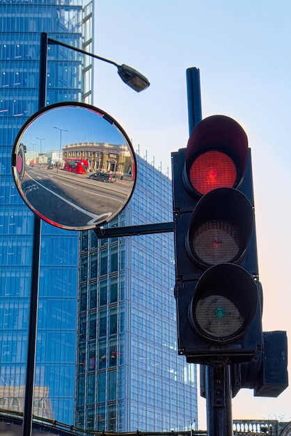 Red Bus and Red Traffic Light in London