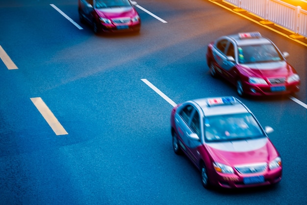 A red cab on the road