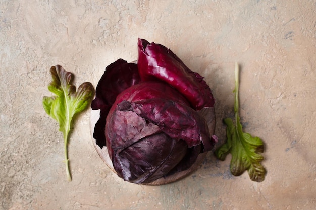 Red cabbage on concrete background