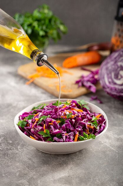 Red cabbage salad with carrots in a bowl