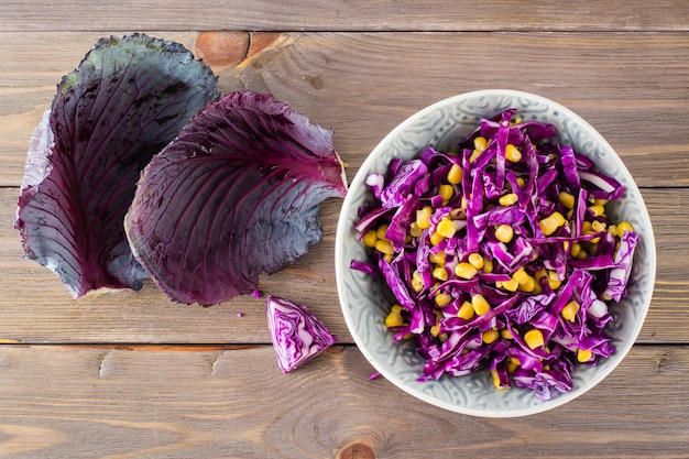 Red cabbage salad with corn grains