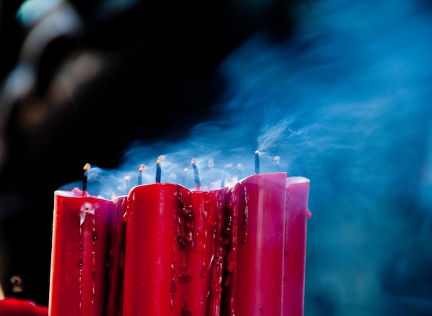 Red candles with smoke