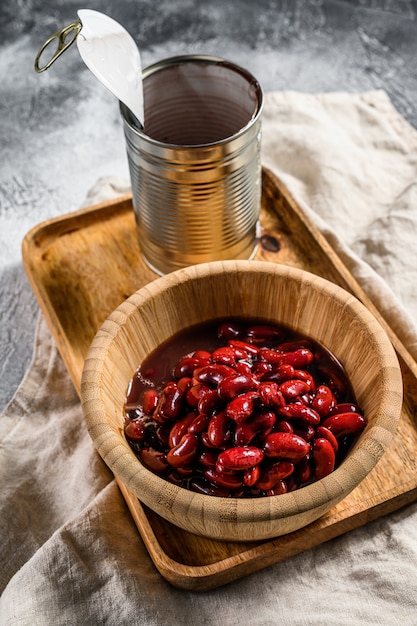 Red canned beans in a bamboo bowl. Top view.