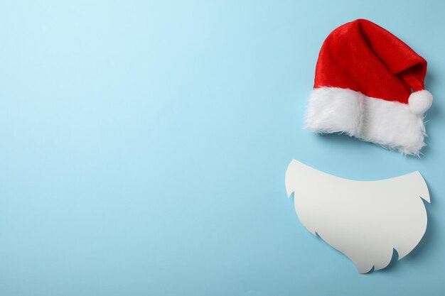 Red cap of santa claus with a white beard