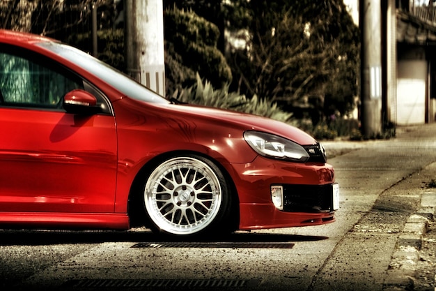 Red car parked on street