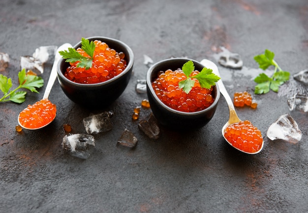 Red caviar on a black