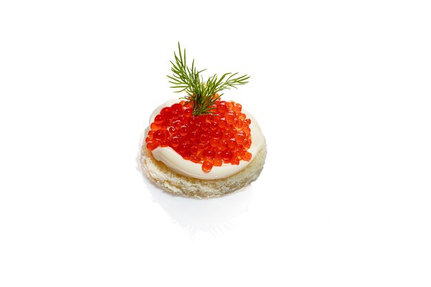 Red caviar on white isolated